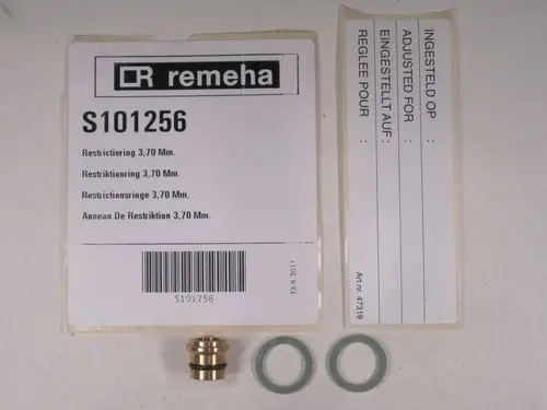 Remeha Drossel, bestehend aus einer Metallkomponente und zwei Dichtungsringen, mit Artikelnummer S101256. Verpackung mit Zusatzinformationen.